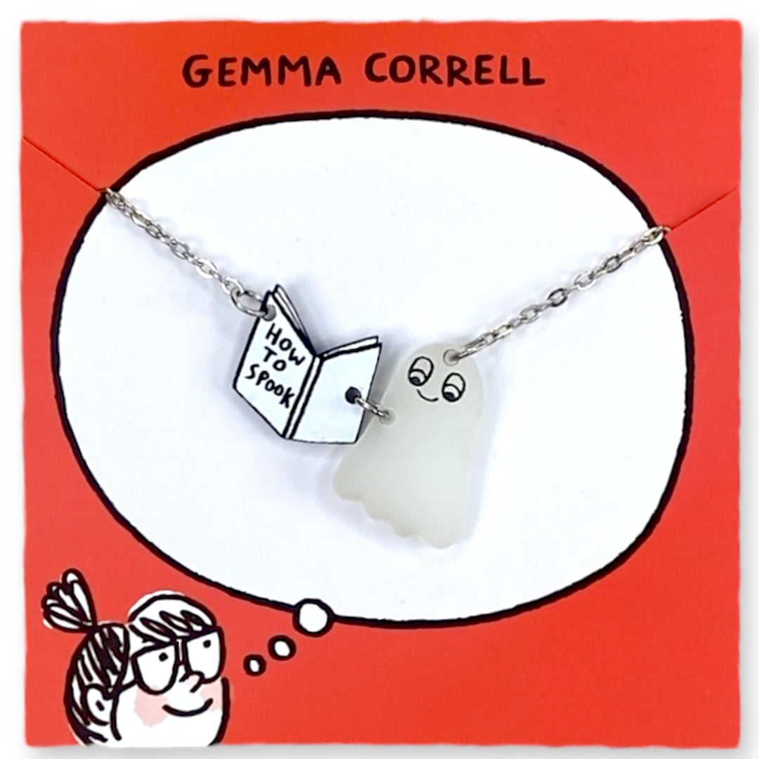 Officially licensed Gemma Correll  spooky ghost and book charm necklace on a branded red card.