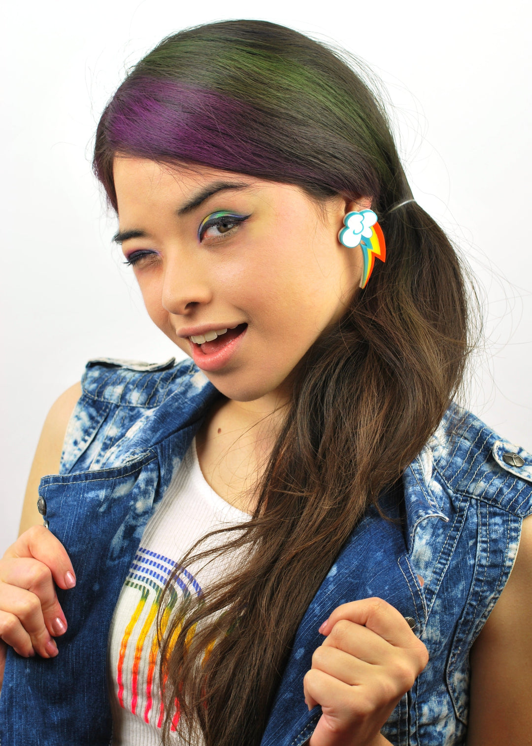 Model wears Rainbow Dash Cutie Mark handmade earrings by Vinca.