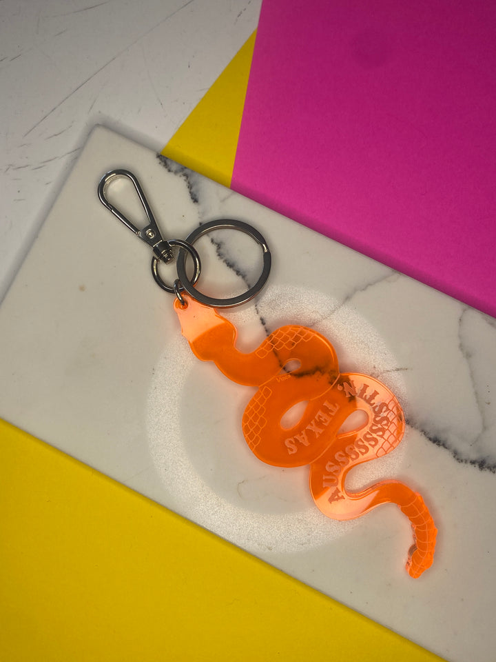 Sample Rattlesnake Keychain in transparent orange (D-1022)