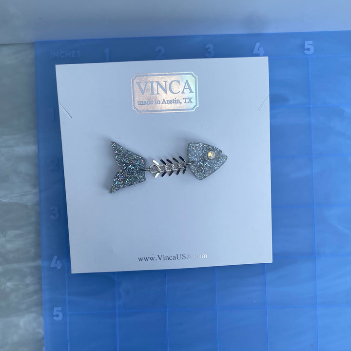 Prototype Fishbone lapel pin (bin C-12-07)