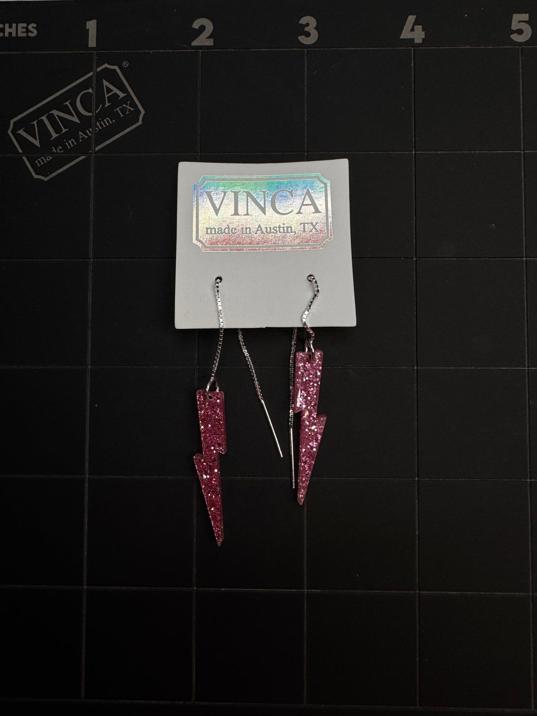 Solid Glitter Pink Lightning Bolt ear threaders samples