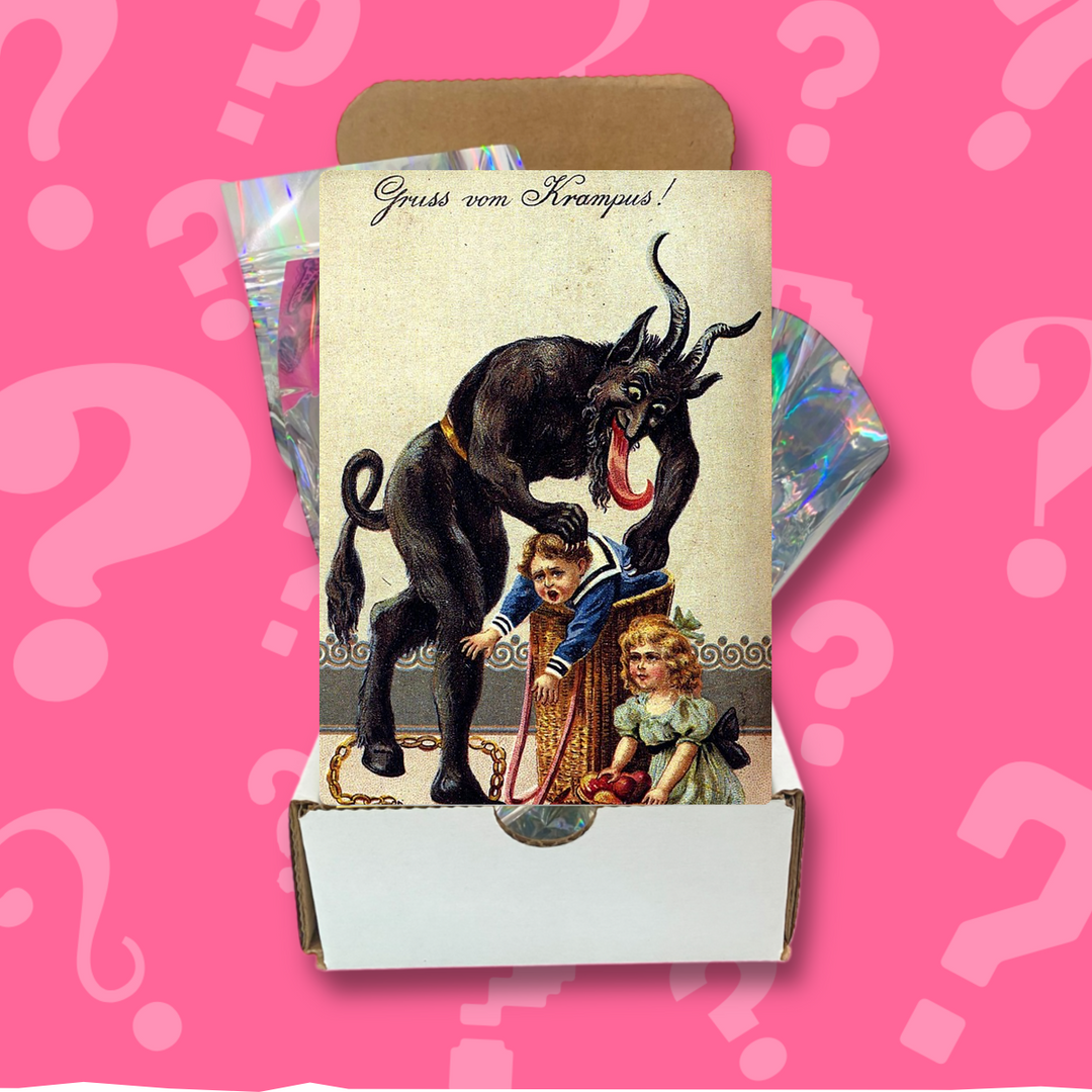 Statement Earring Society subscription box with a vintage Krampus postcard, on a pink question mark background
