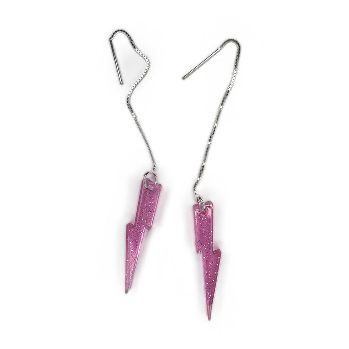 Clear pink glitter lightning bolt ear threaders with sterling silver box chains on white