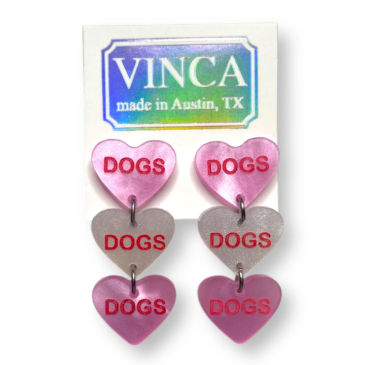 Handmade Valentine candy heart dogs earrings in pink and white with surgical steel posts. 