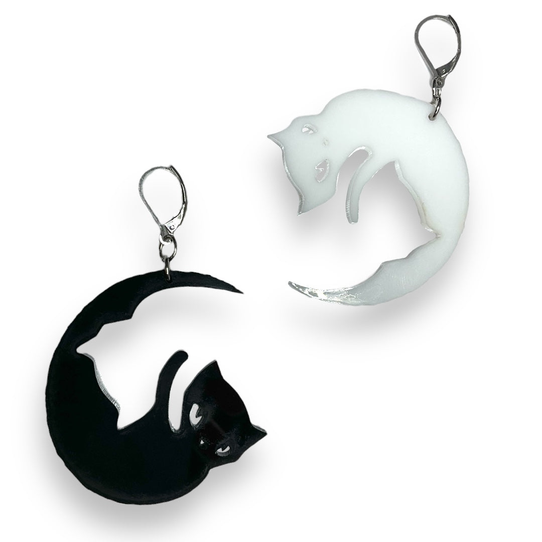 Officially licensed Emily the Strange Yin Yang Cat, black and white hook dangle earrings apart on a white background.