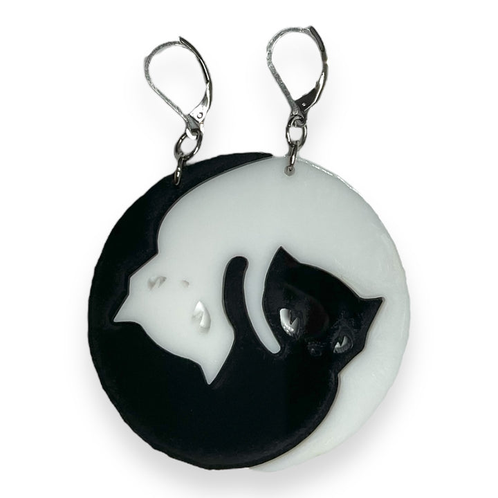 Officially licensed Emily the Strange Yin Yang Cat, black and white hook dangle earrings on a white background.