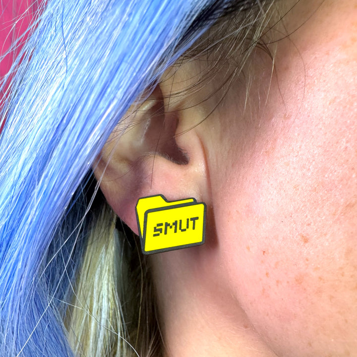 Handmade Smut Folder icon technology earrings with surgical steel posts on a model