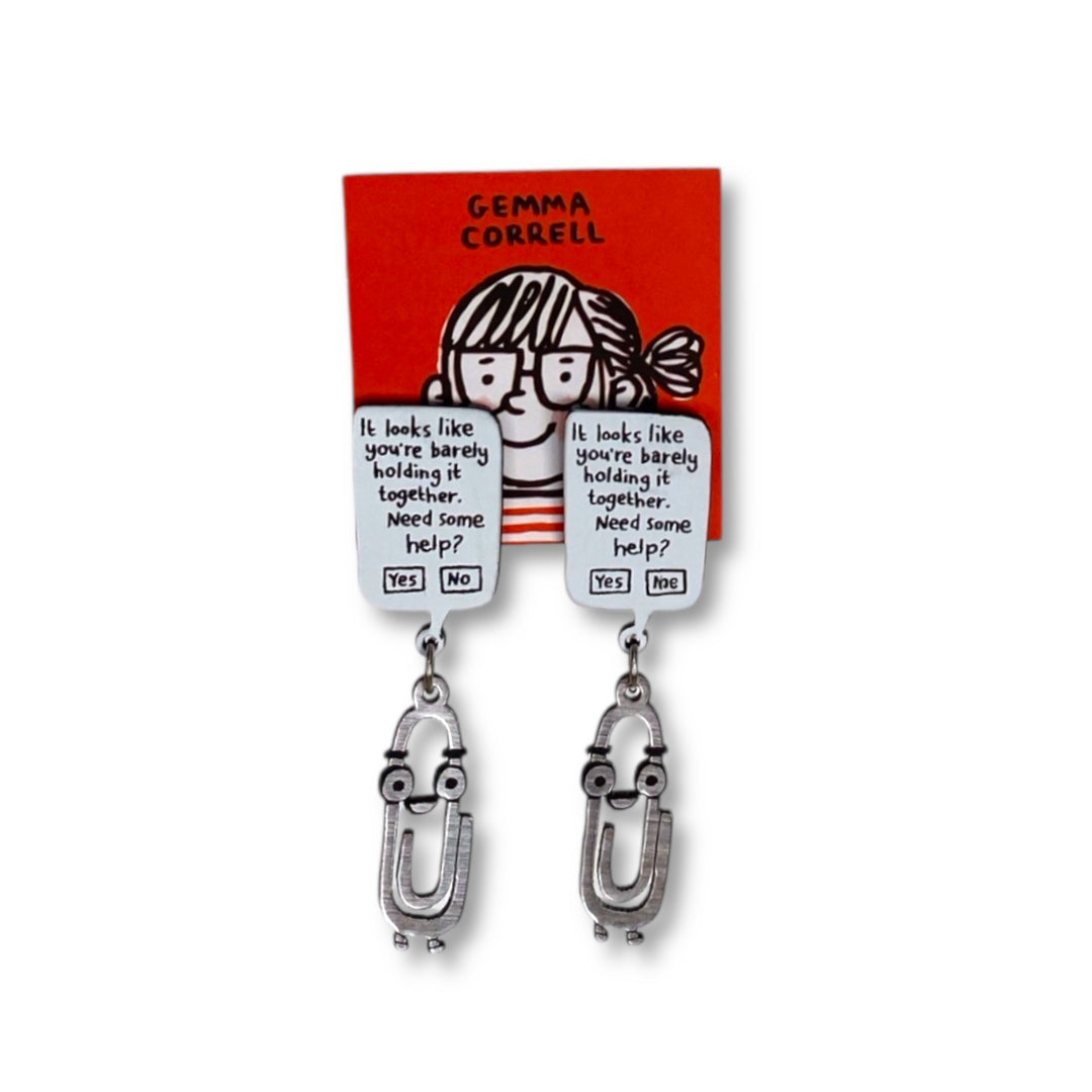 A pair of Clippy the paper clip earrings by Gemma Correll on a white background.