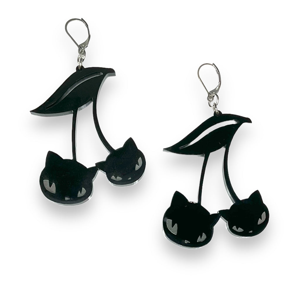 Handmade officially licensed Emily the Strange black cat cherry hook dangle earrings on a white background.