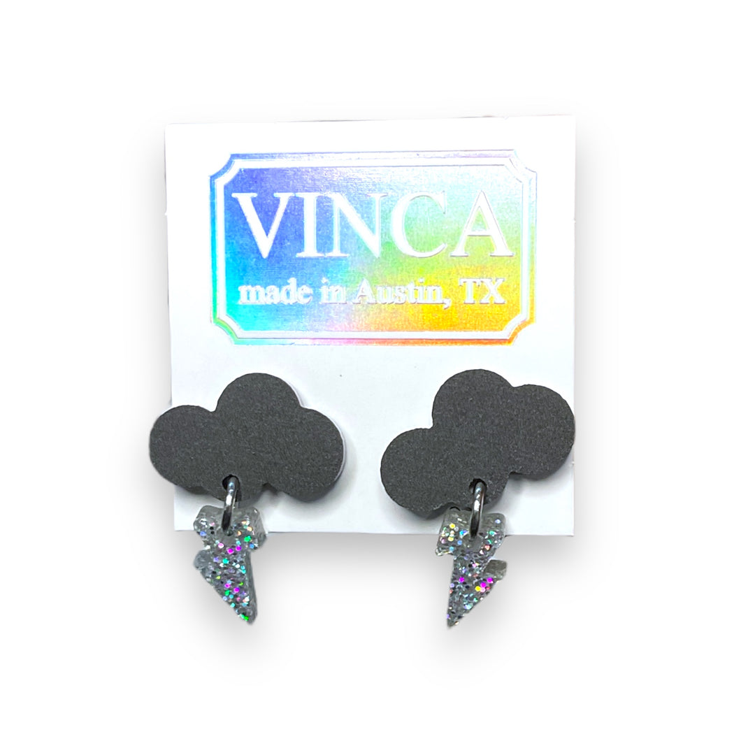 cute and quirky matte black raincloud earrings handmade with glitter lightning bolts