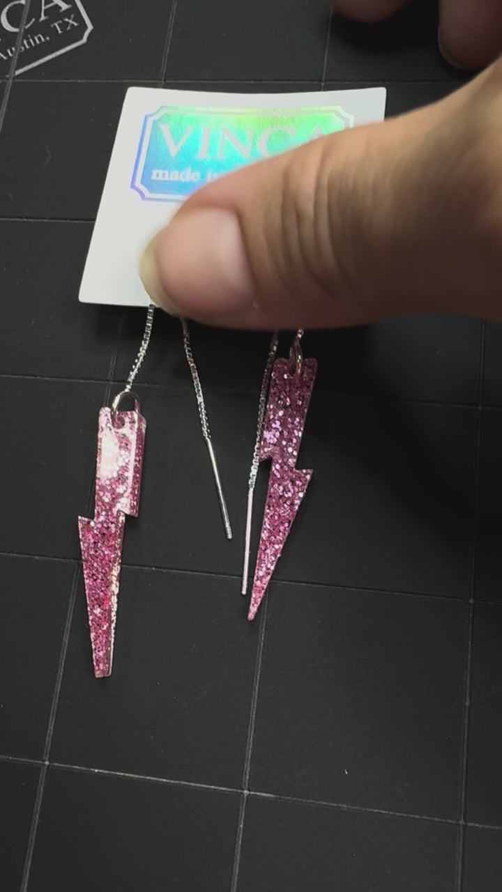 Solid Glitter Pink Lightning Bolt ear threaders samples