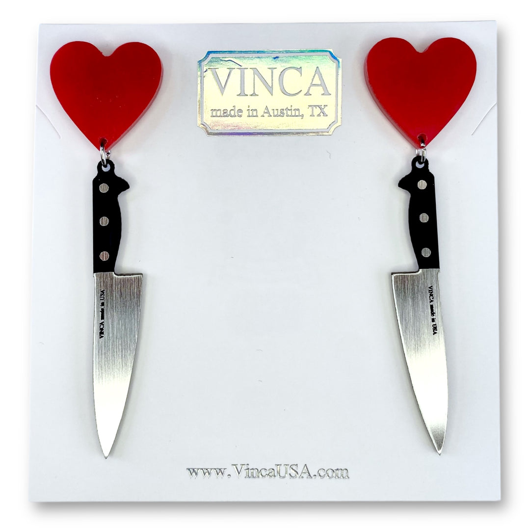 I Heart Knives earrings in sassy red on a white branded Vinca card set against a white background.