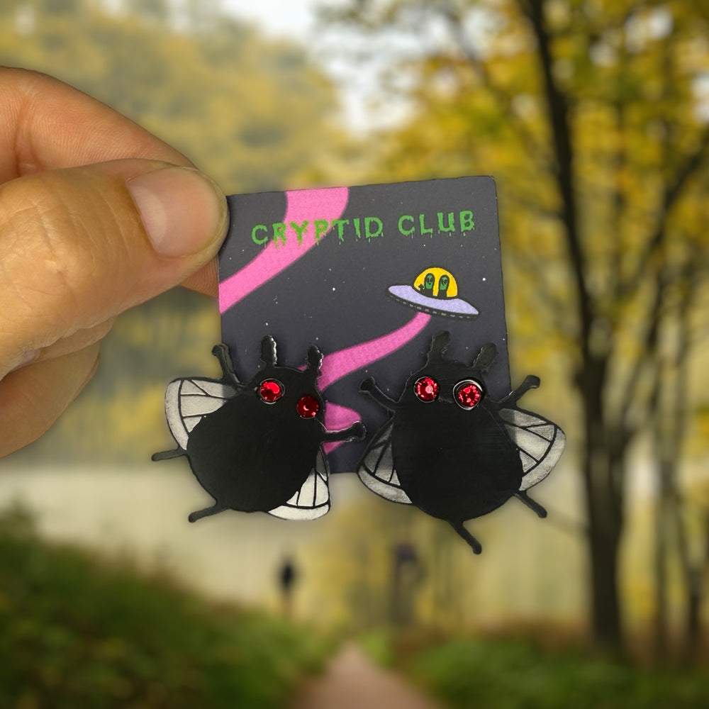 Cryptid Club by Sarah's Scribbles mothman stud earrings on a card