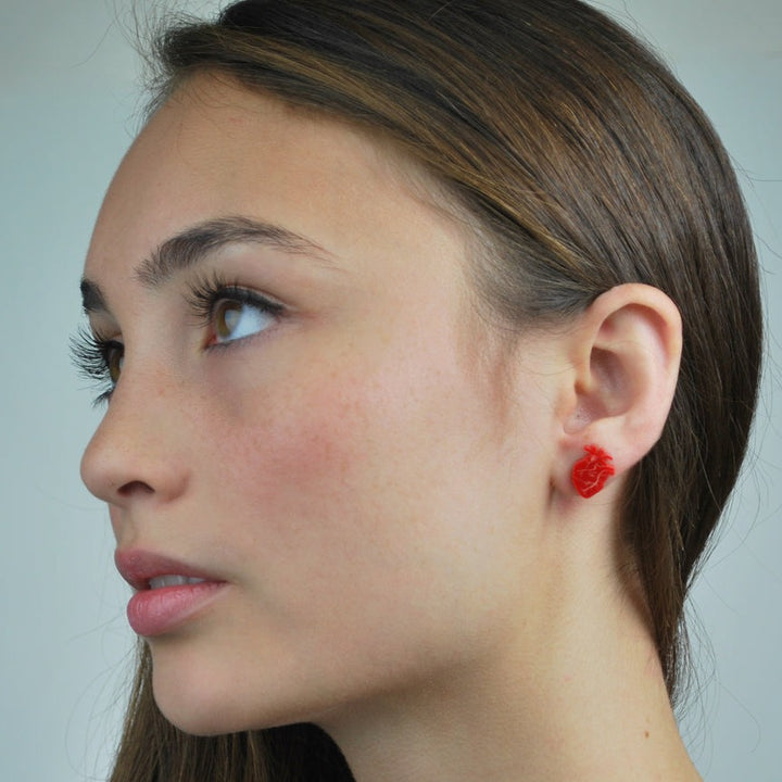 Handmade red anatomical heart stud earrings with surgical steel posts.