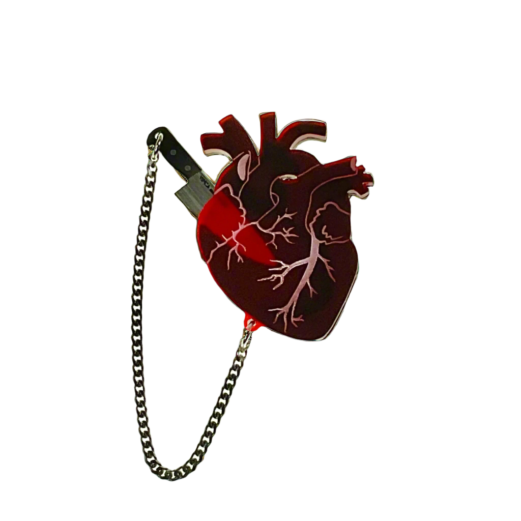 Our  handmade Heart of Aghast brooch is floating against a transparent background.