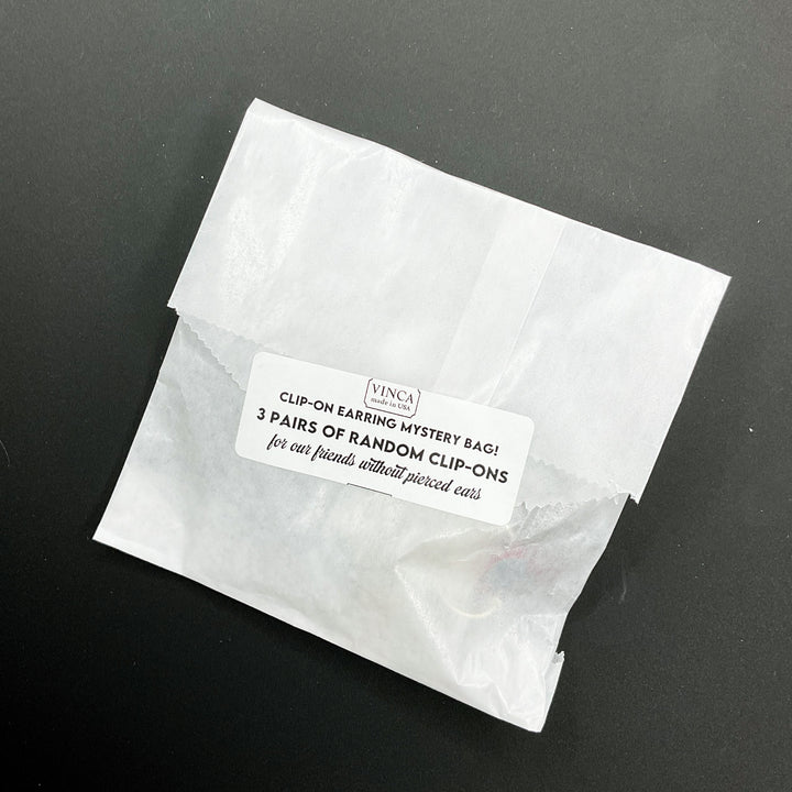 Our Clip On Mystery Bag contains three items per bag.